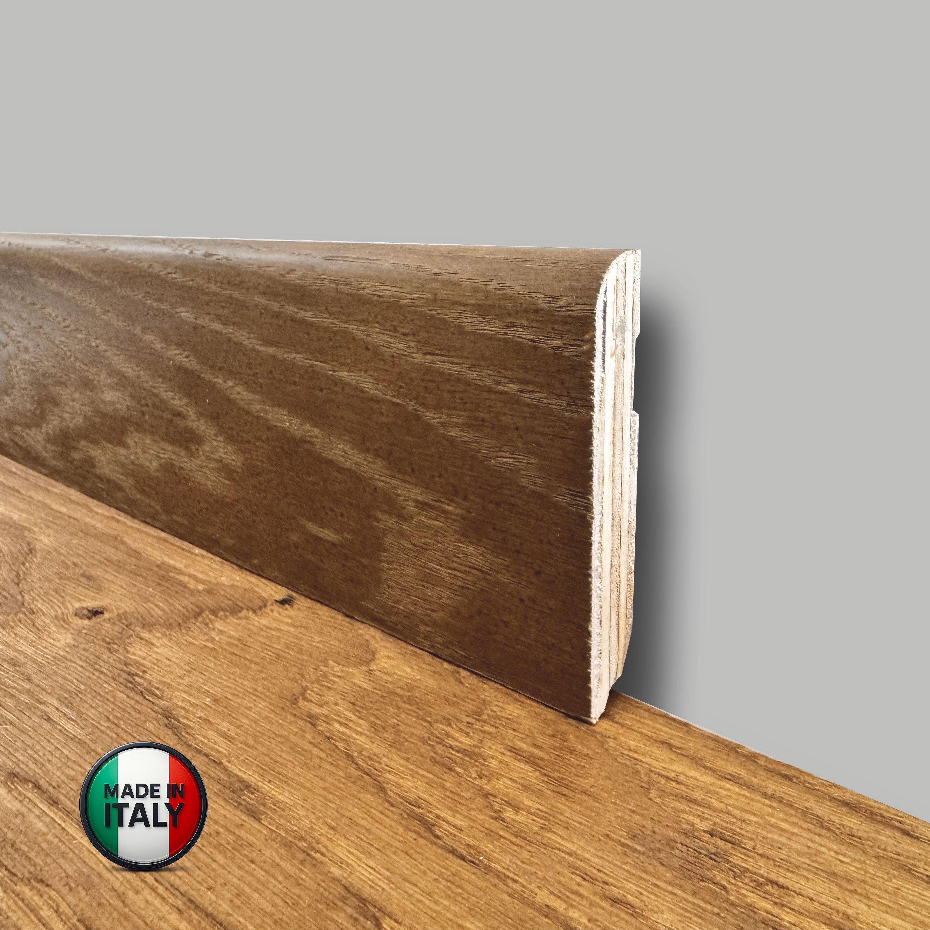 €1,49ml  ** FUORI TUTTO ** Lotti da 85ml di Battiscopa in legno multistrato impiall. ROVERE NOCCIOLA 82x13mm - Eternal Parquet
